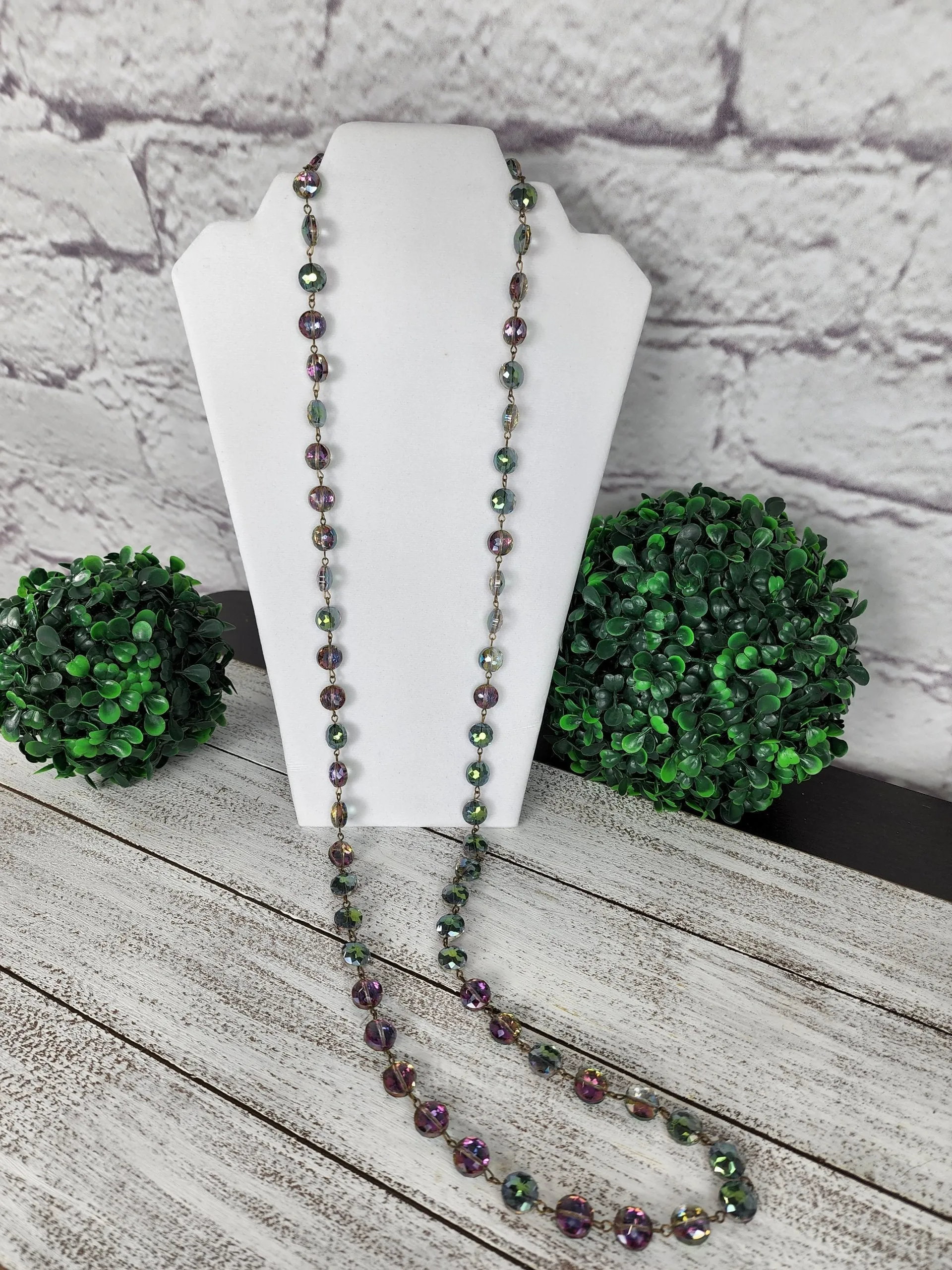 Faceted crystal on bronze wire necklace