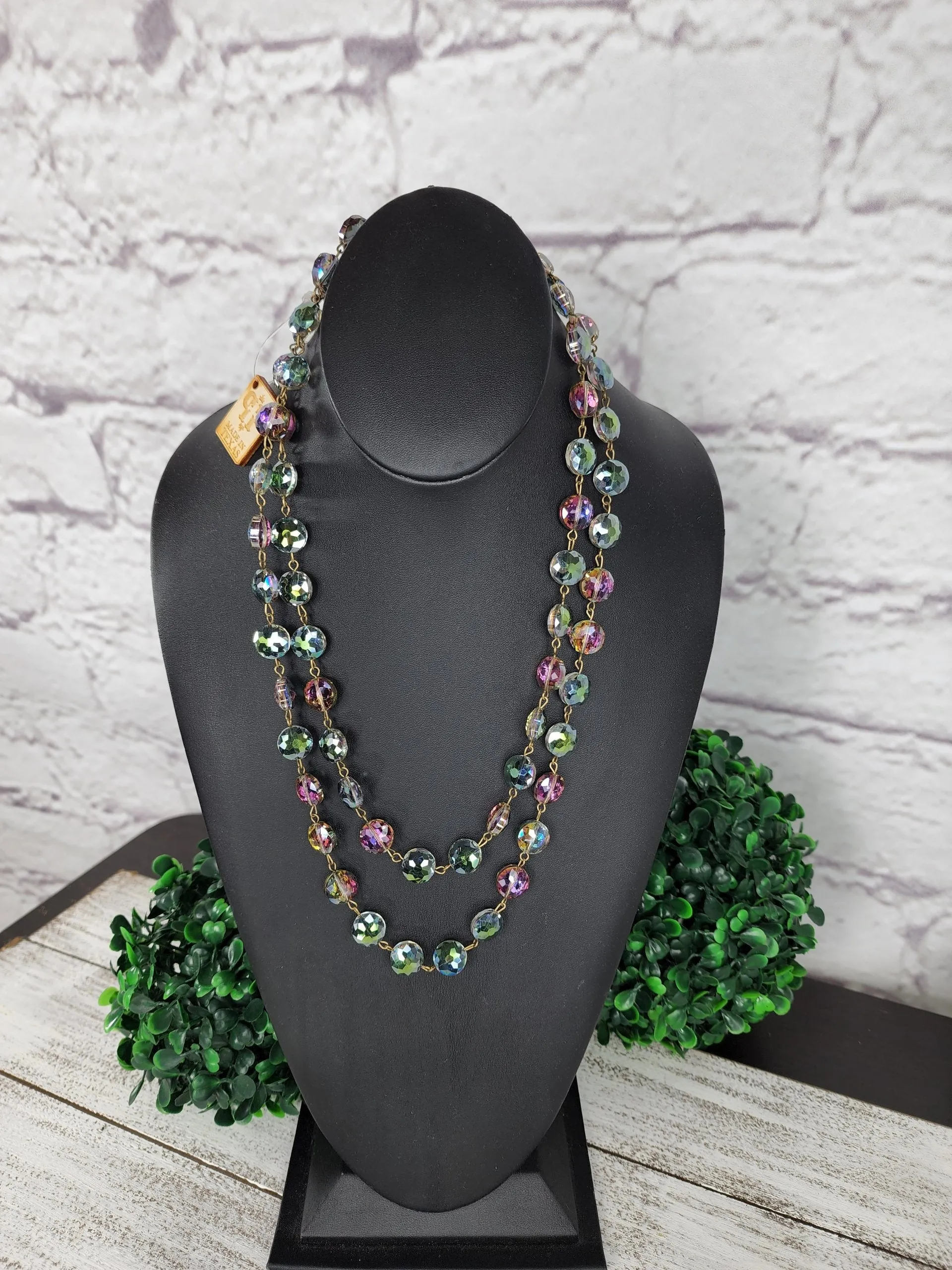 Faceted crystal on bronze wire necklace