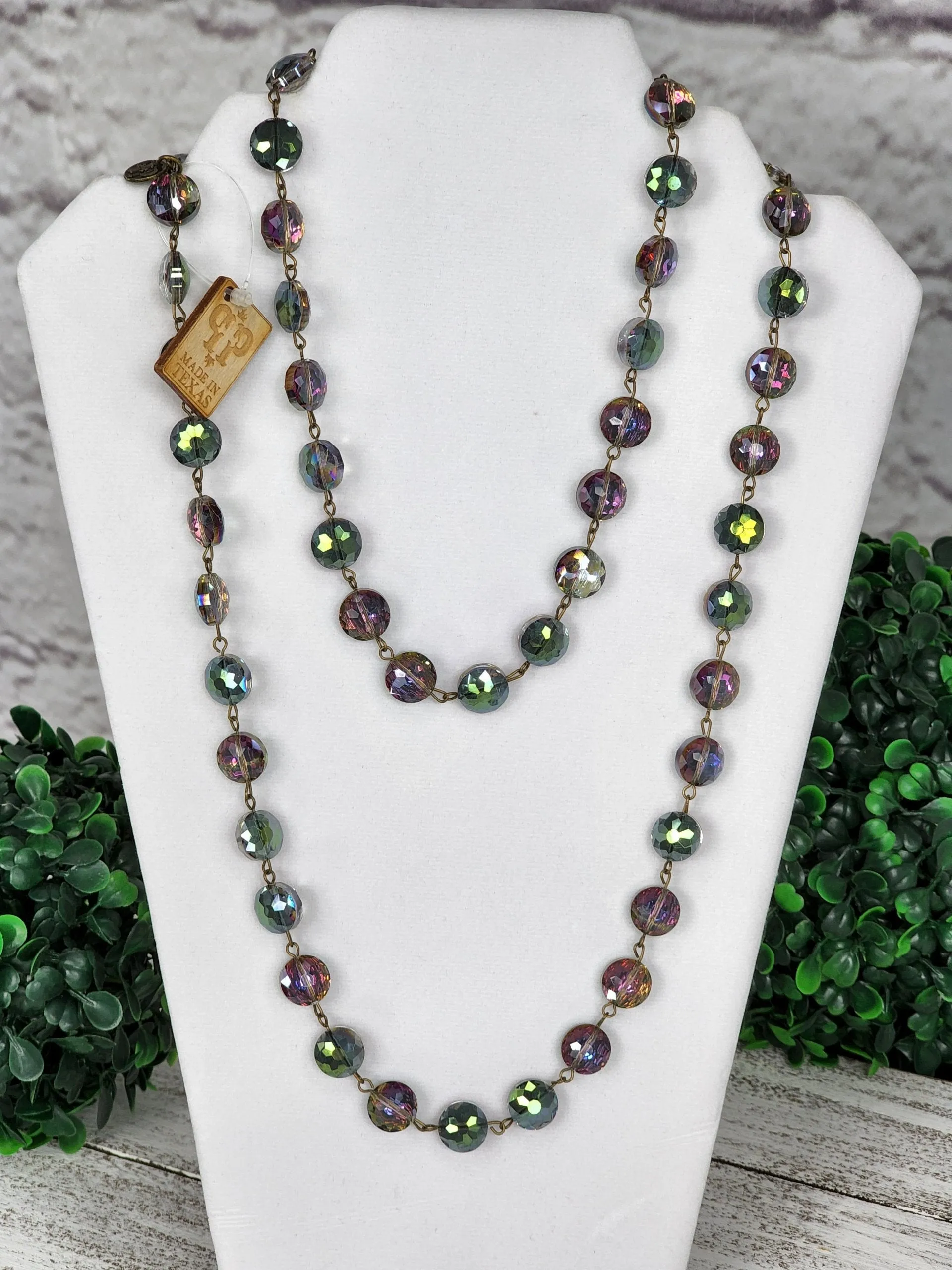Faceted crystal on bronze wire necklace